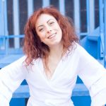 camicia bianca incrociata